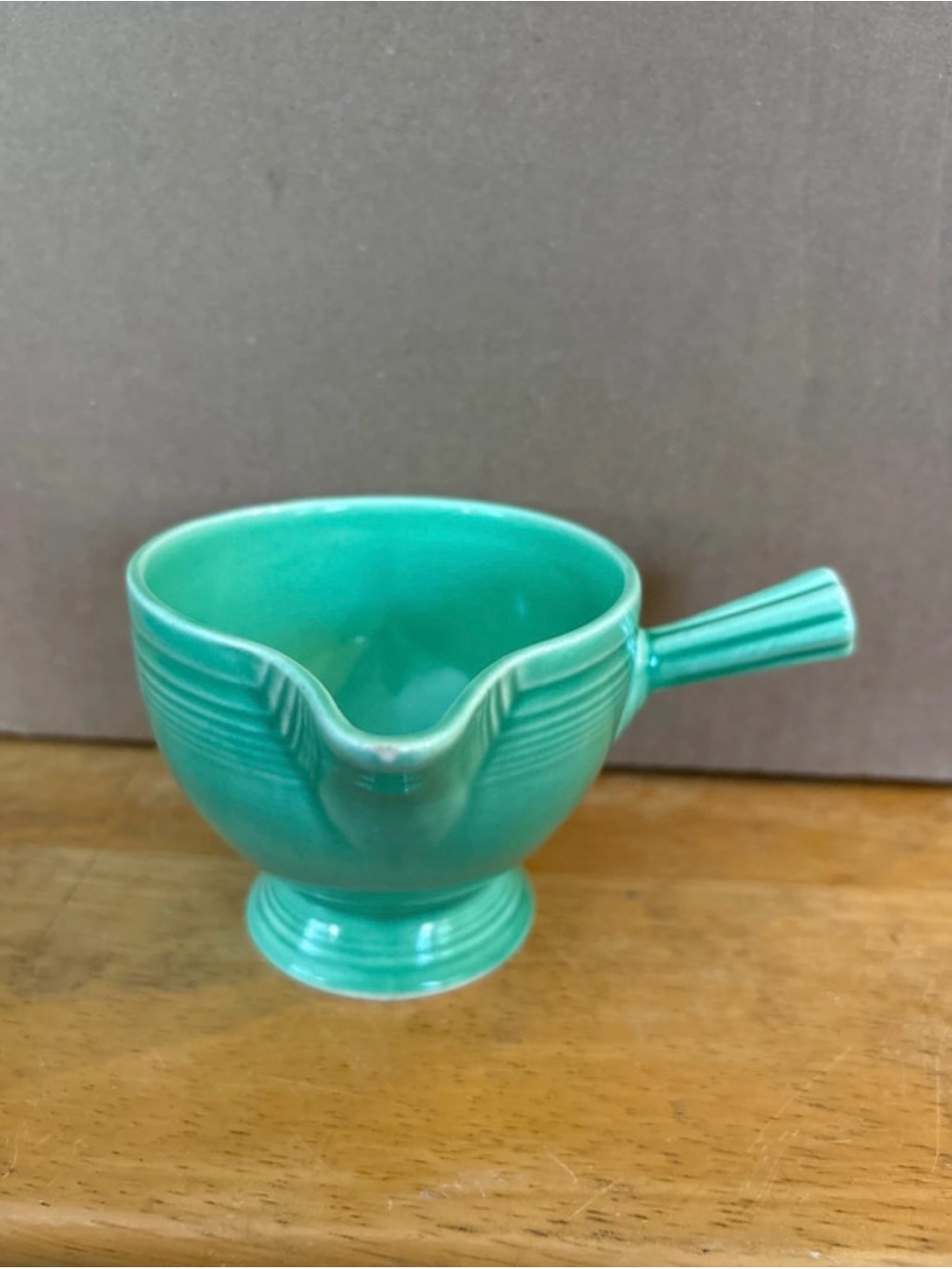 Antique Turquoise Fiesta Creamer with stick handle HTF